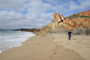 Katherine walking on the beach at Castle Rock, Flinders Island Castle Rock, Flinders Island